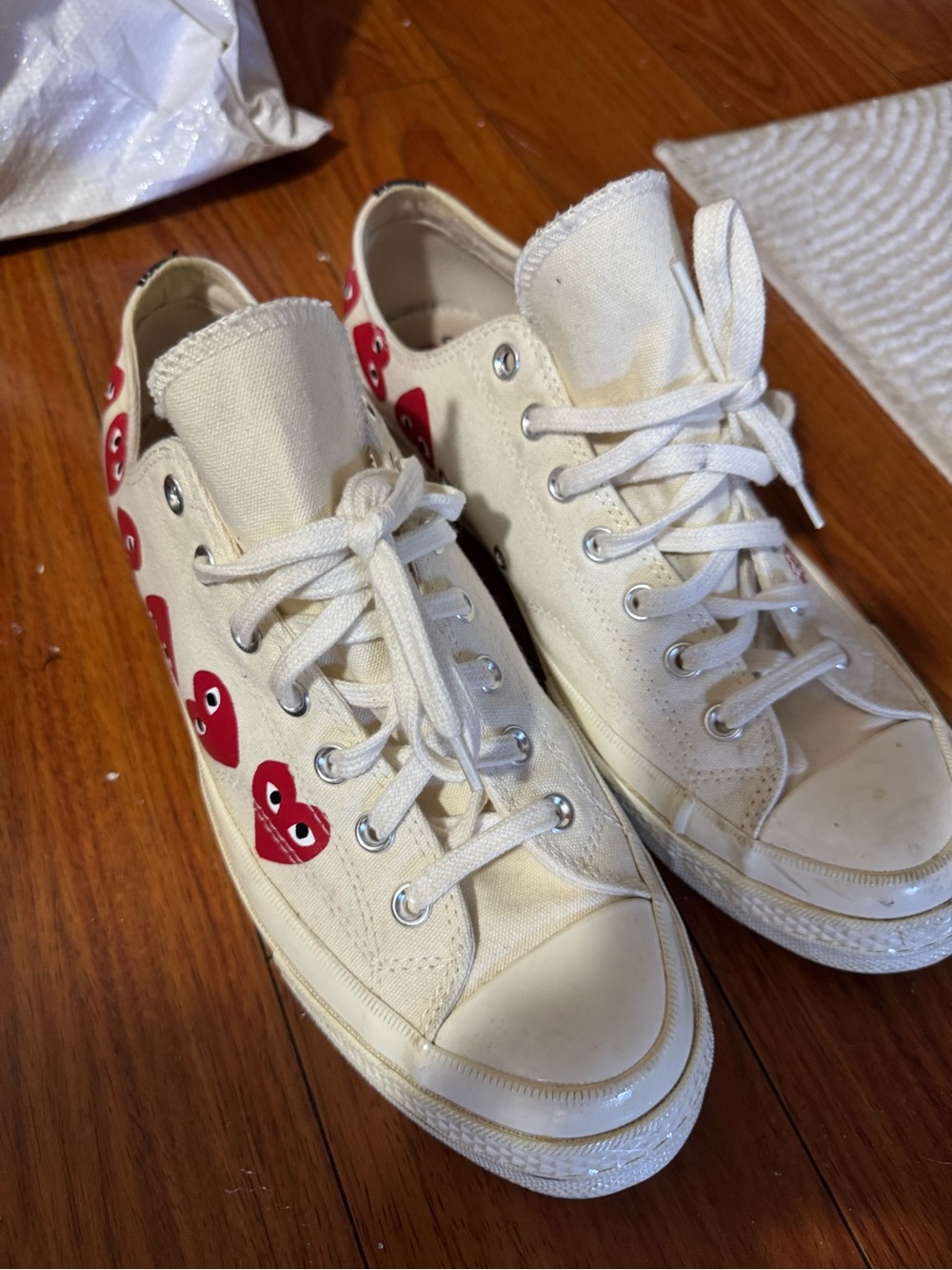 Comme des Garcons Play White Canvas Low-Top Sneakers with Red Heart Motif